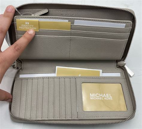 michael kors 32f6sm9e9l|Leather Continental Wristlet .